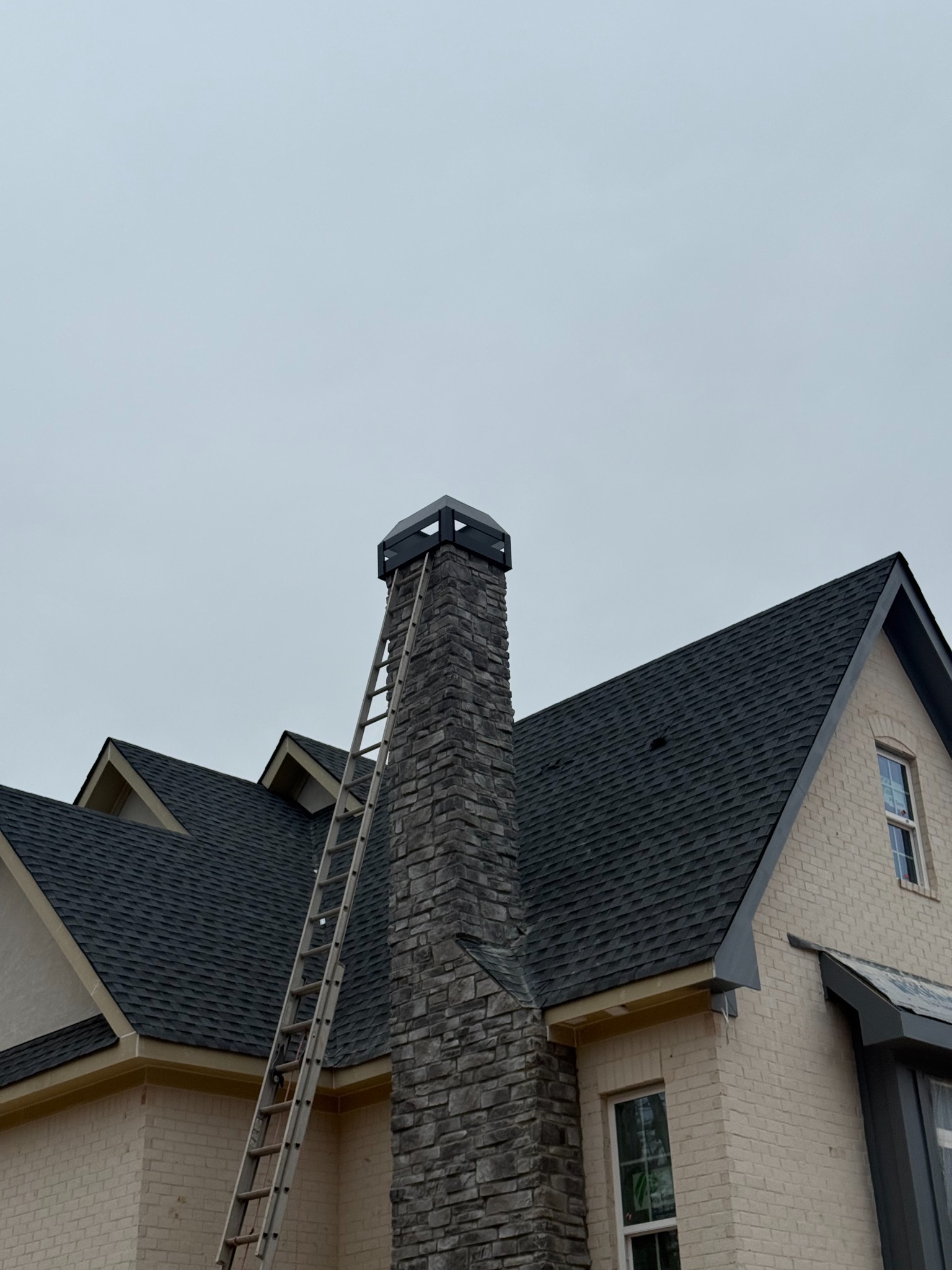New roof and chimney cap installation