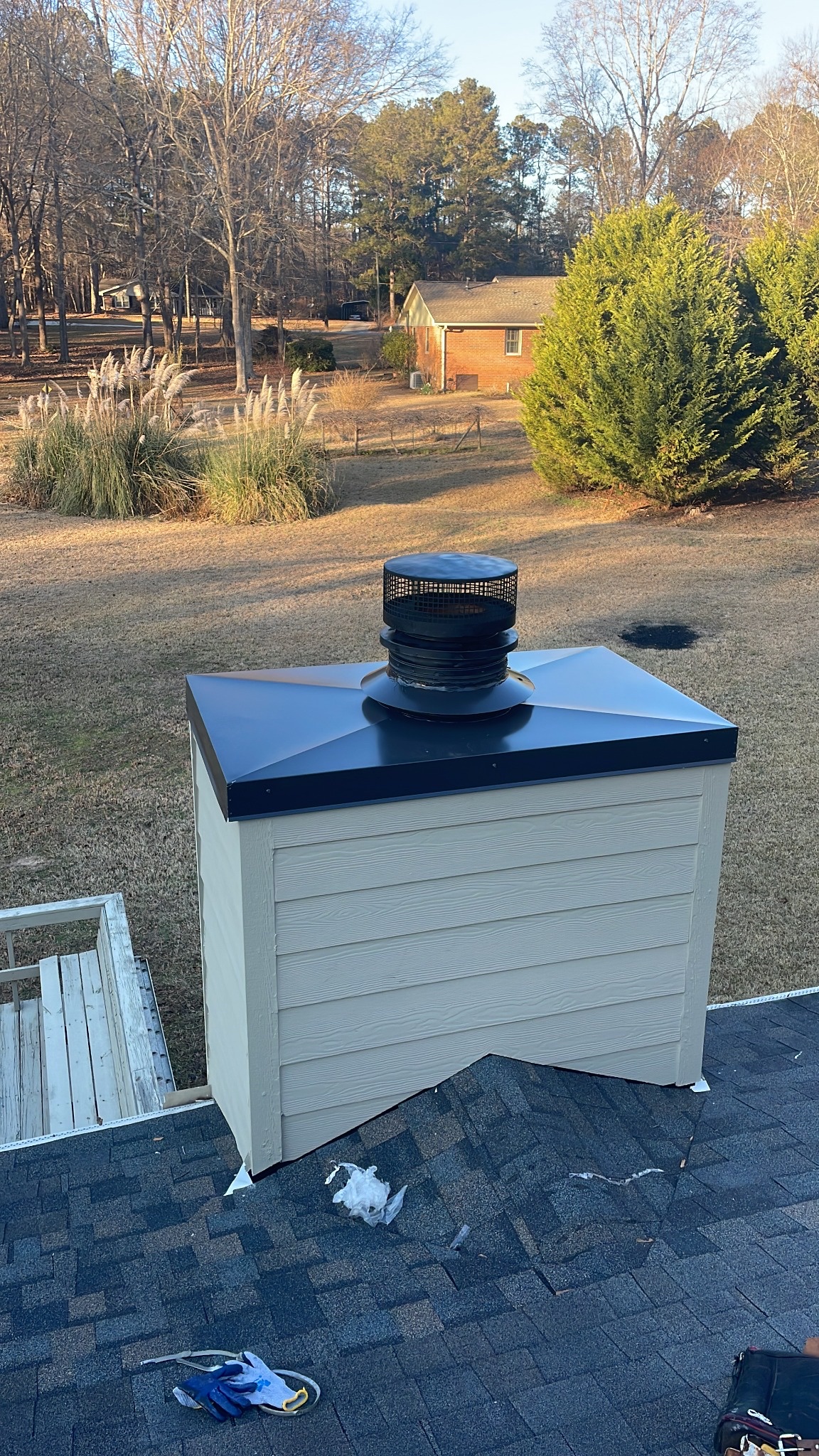 Completed siding and chimney cap project